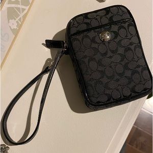 COACH wristlet.